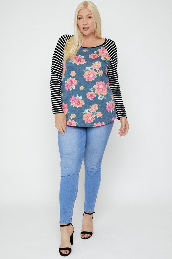 Floral Top Featuring Raglan Style Striped Sleeves And A Round Neck